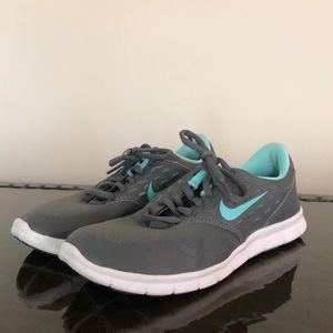 Blue and gray Nike Women’s tennis shoes